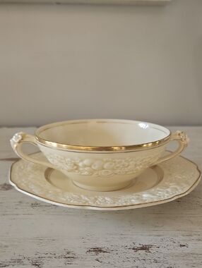 Crown Ducal Ivory and 22K Gold Embossed Two-Handled Soup Bowl with Saucer